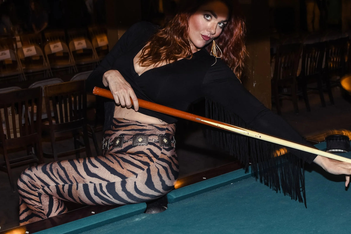 Women’s 70s inspired tiger print flared pants with high rise waist