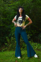 Women’s blue bell bottom pants with high rise elastic waist
