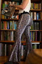Women’s high waisted snake print bell bottom pants

