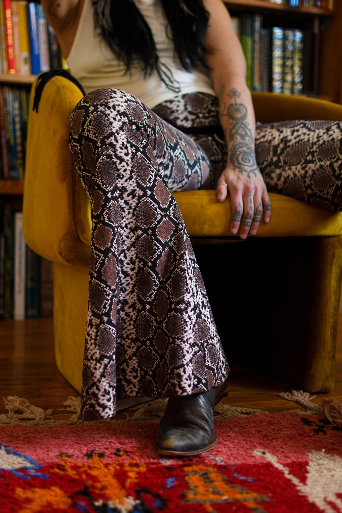 Desert Rattler 70s inspired flare pants with rattlesnake print
