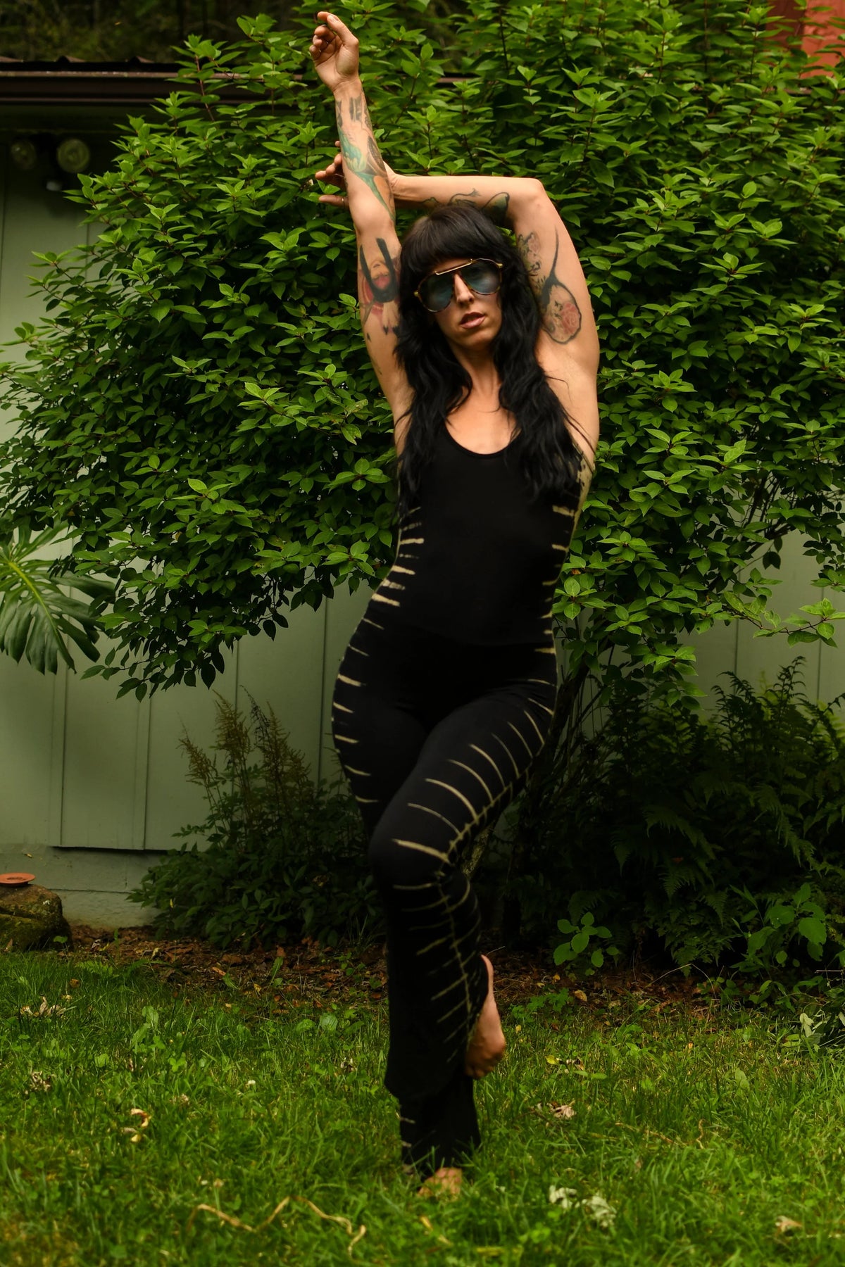 Lexi stretchy flare leg jumpsuit with open back and bell bottoms
